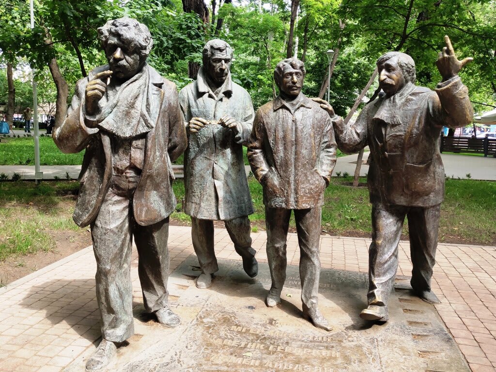 "Men" sculpture group
