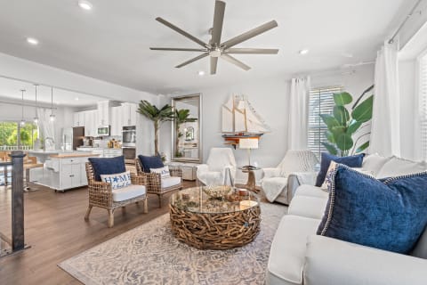 Open-concept living room flowing into the kitchen