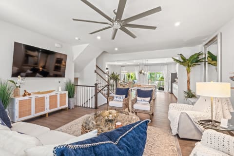 Living room from the sofa, with the lanai doors beyond