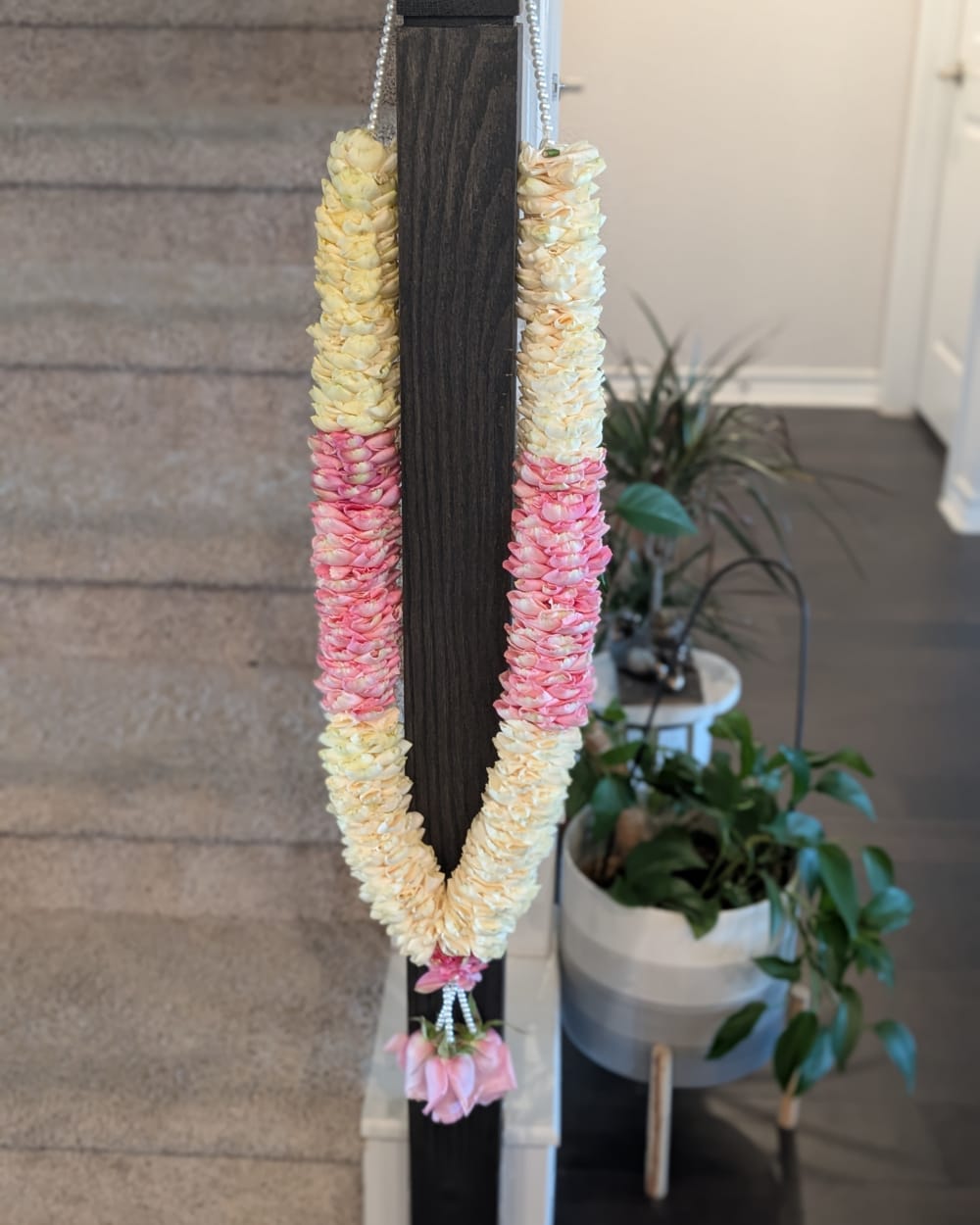 Fresh flower wedding garland in cream and pink, handcrafted by Teja's Floral Artistry