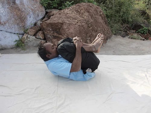 Pavanmuktasana (Wind Relieving Pose)