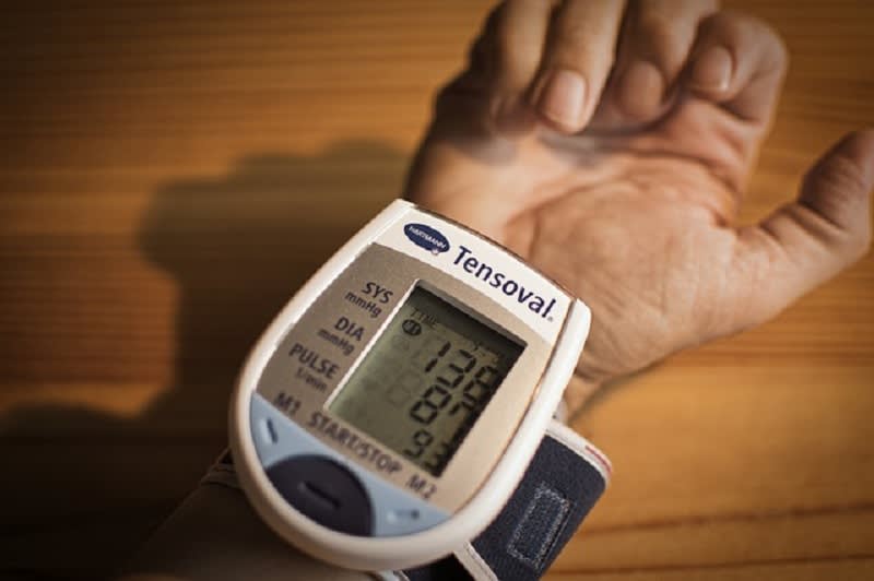 lowers blood pressure with Vinyasa Yoga