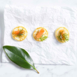 Smoked salmon on herbed blini