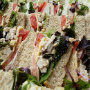 Assorted triangle finger sandwiches
