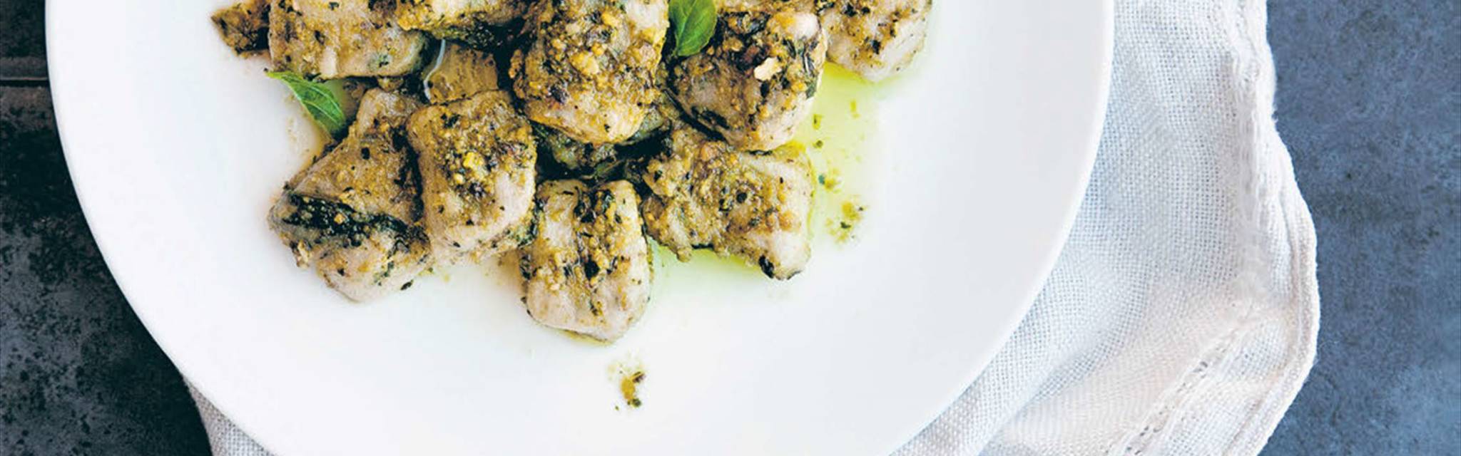 Spinach gnocchi with basil pesto