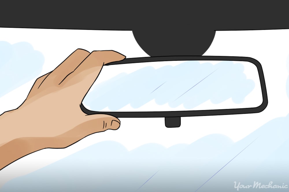 adjusting rearview mirror