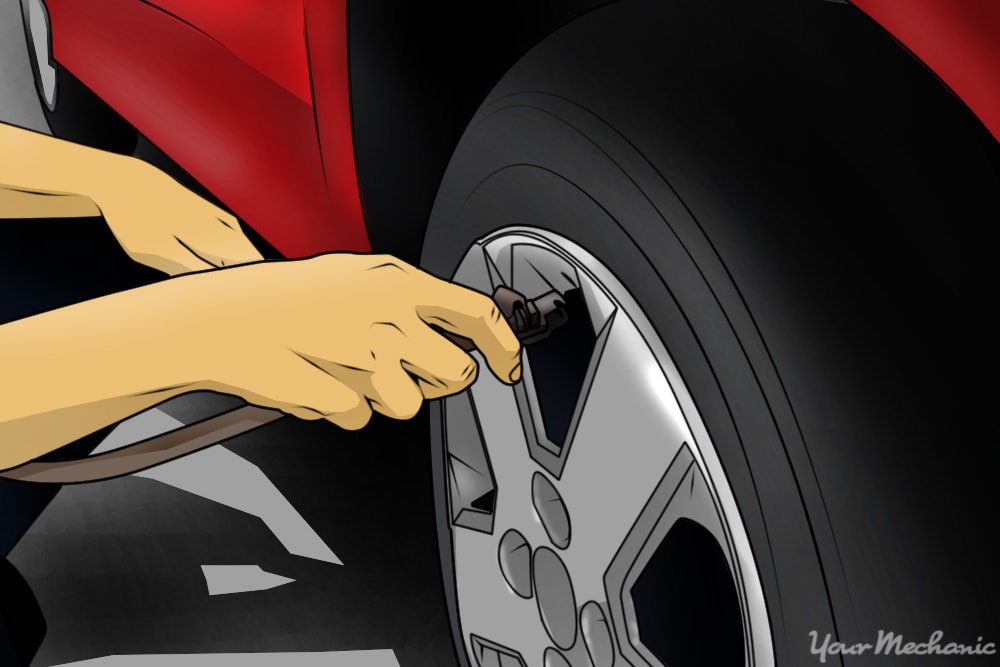 person inflating tires