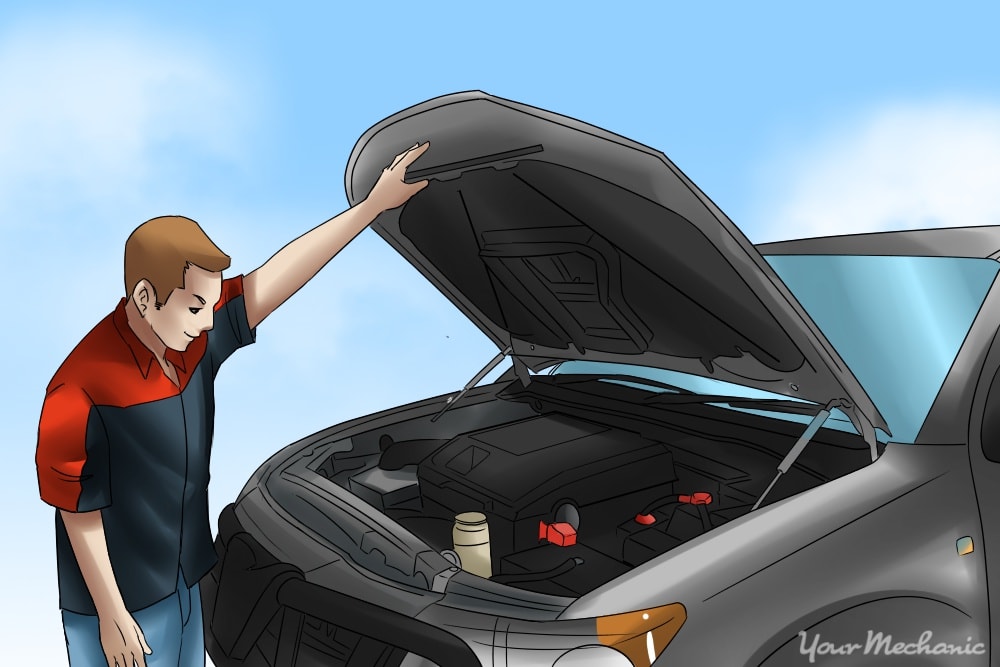 car hood up with person looking at engine