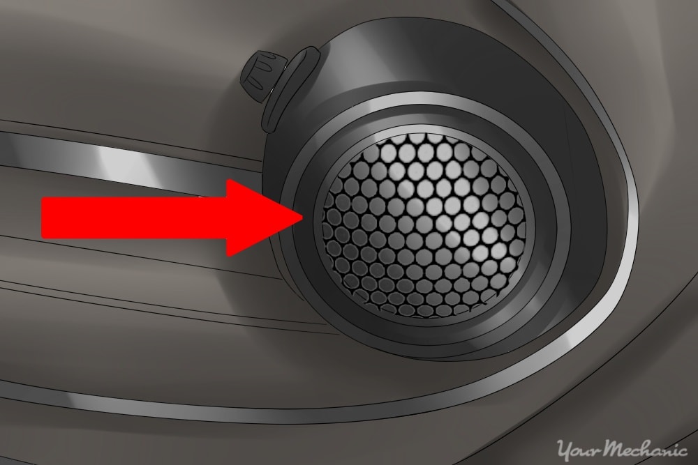 grille covering speaker on side of door