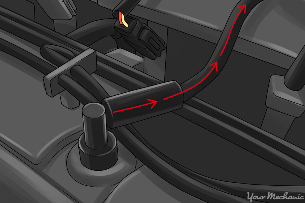 arrows pointing to pcv valve in valve cover and hose going to intake manifold