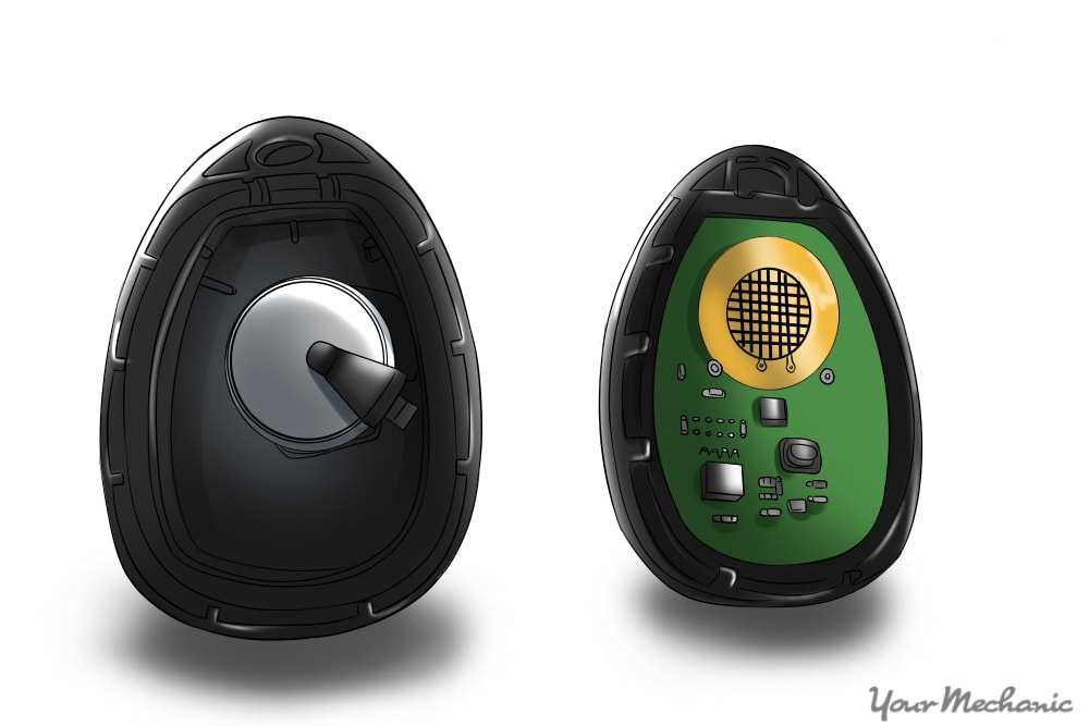 opened key fob showing battery