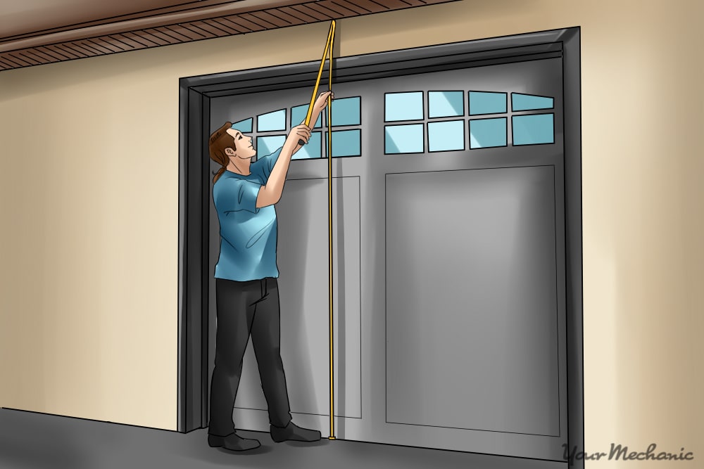  person measuring garage ceiling height