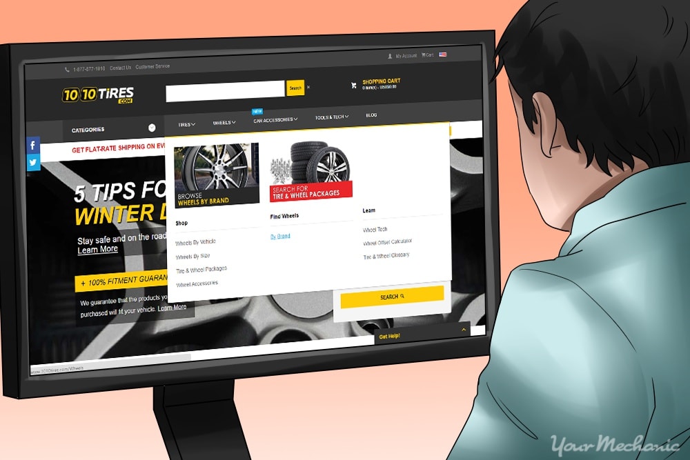 person looking at website shopping for tires