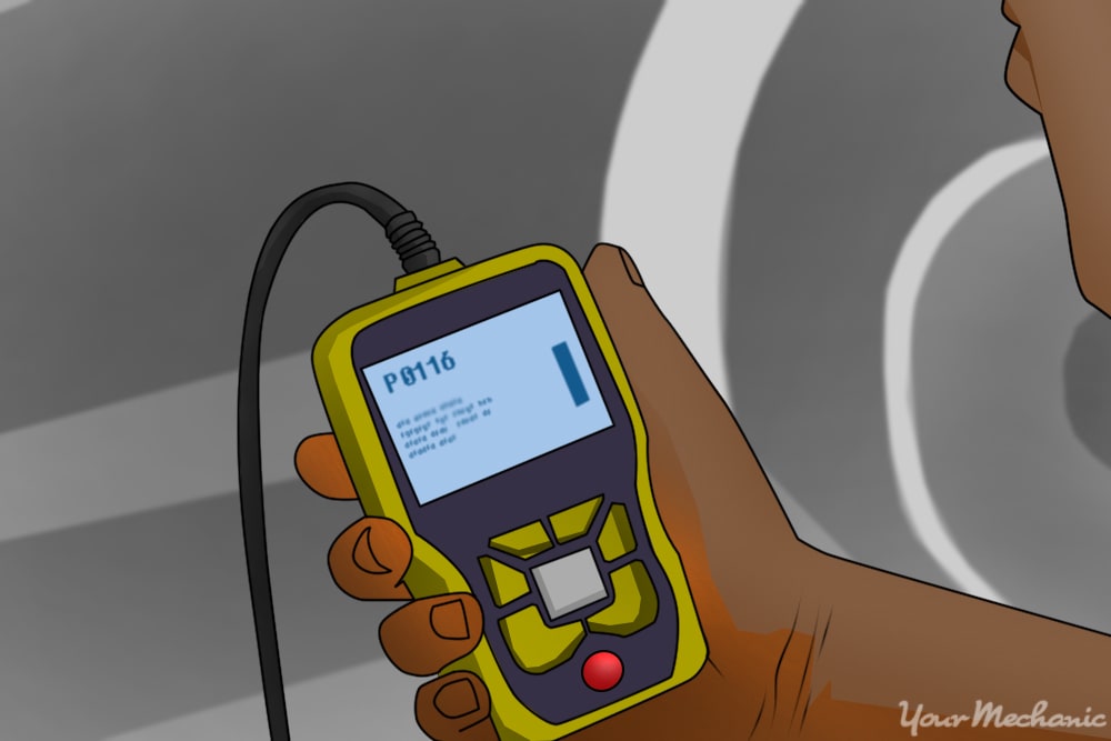 person holding an obd scanner