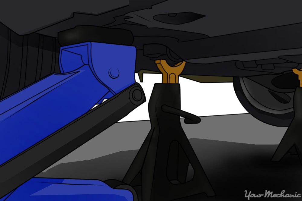 underside of car with safety jacks