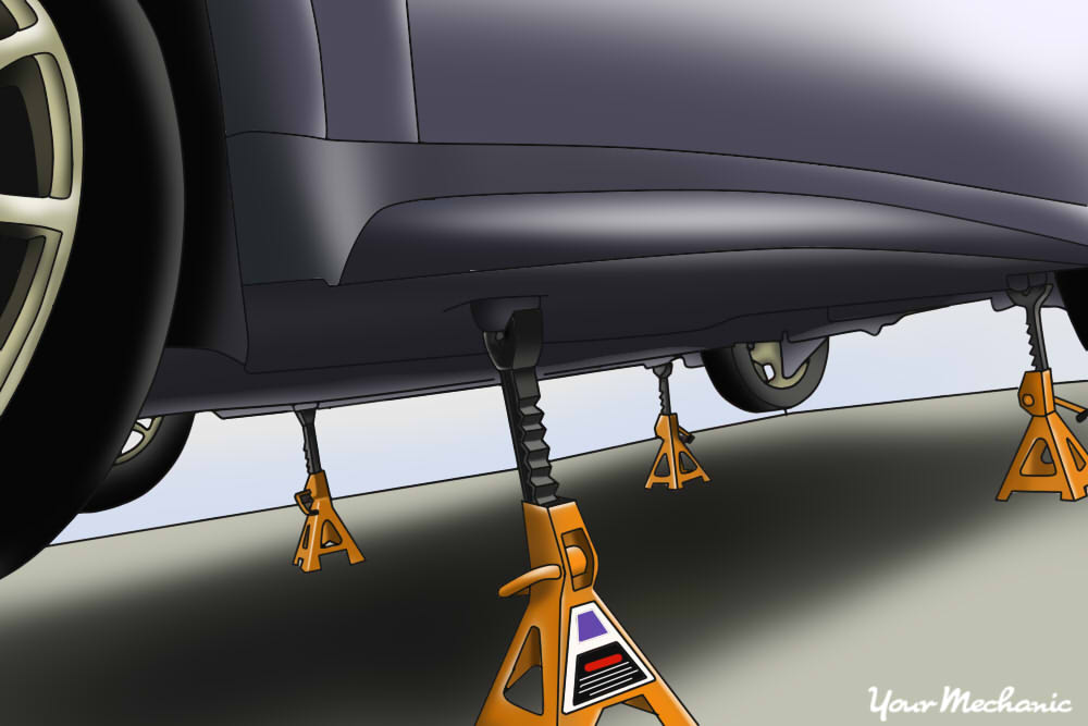 jack stands placed under the vehicle