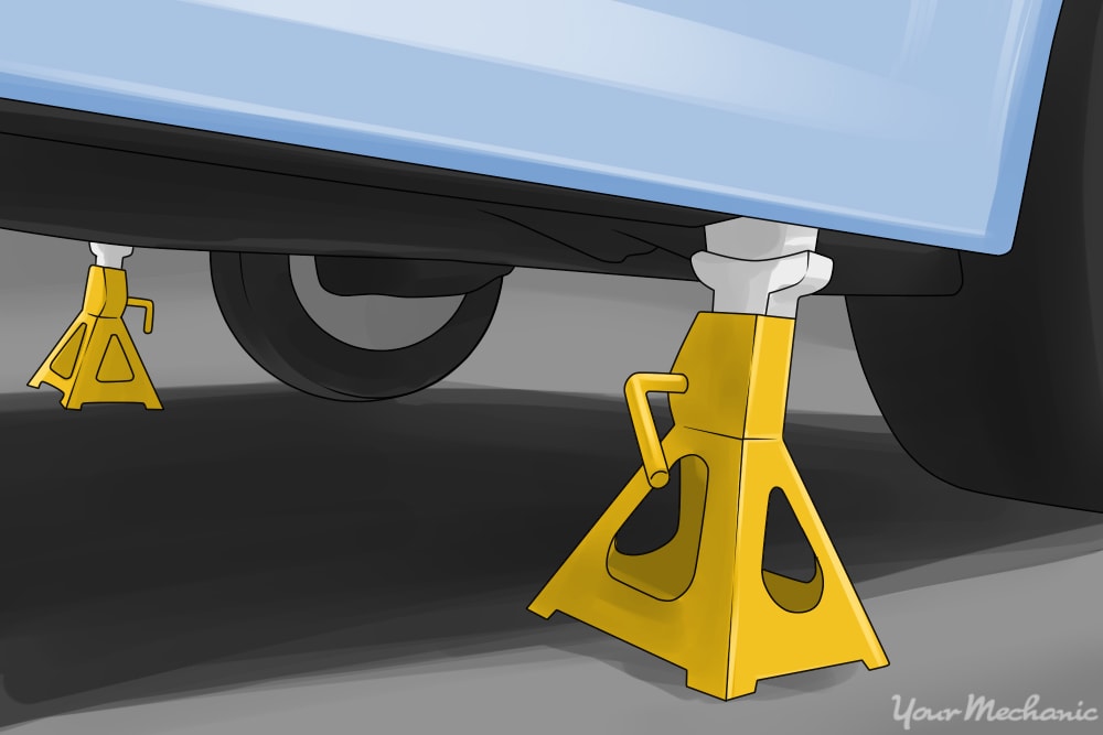 jack stands raising and securing car