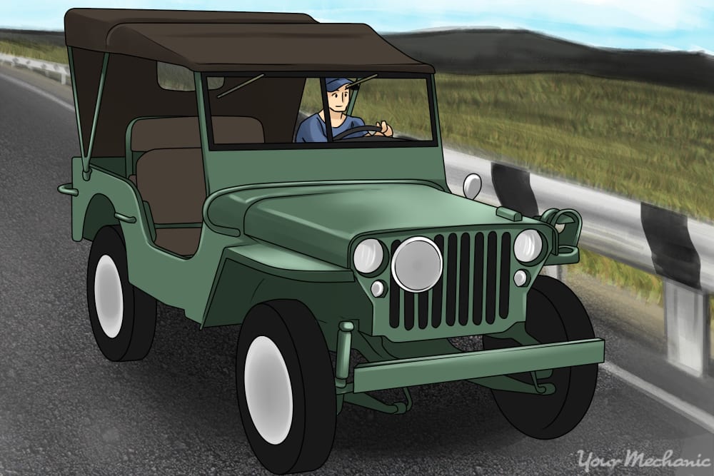 person driving a CJ-5