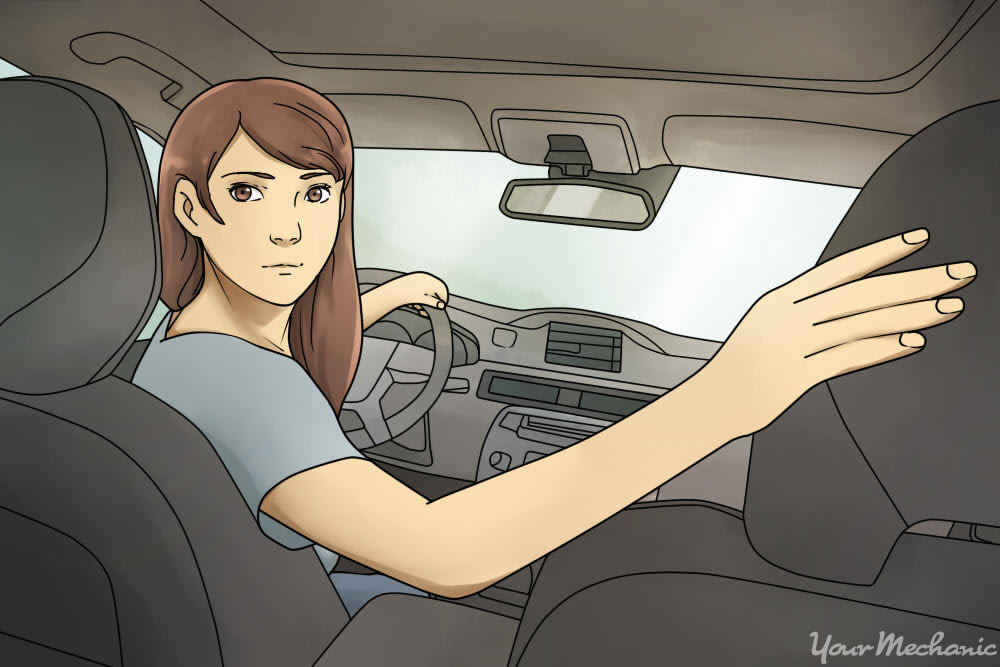 How to Drive a Car in Reverse Gear | YourMechanic Advice