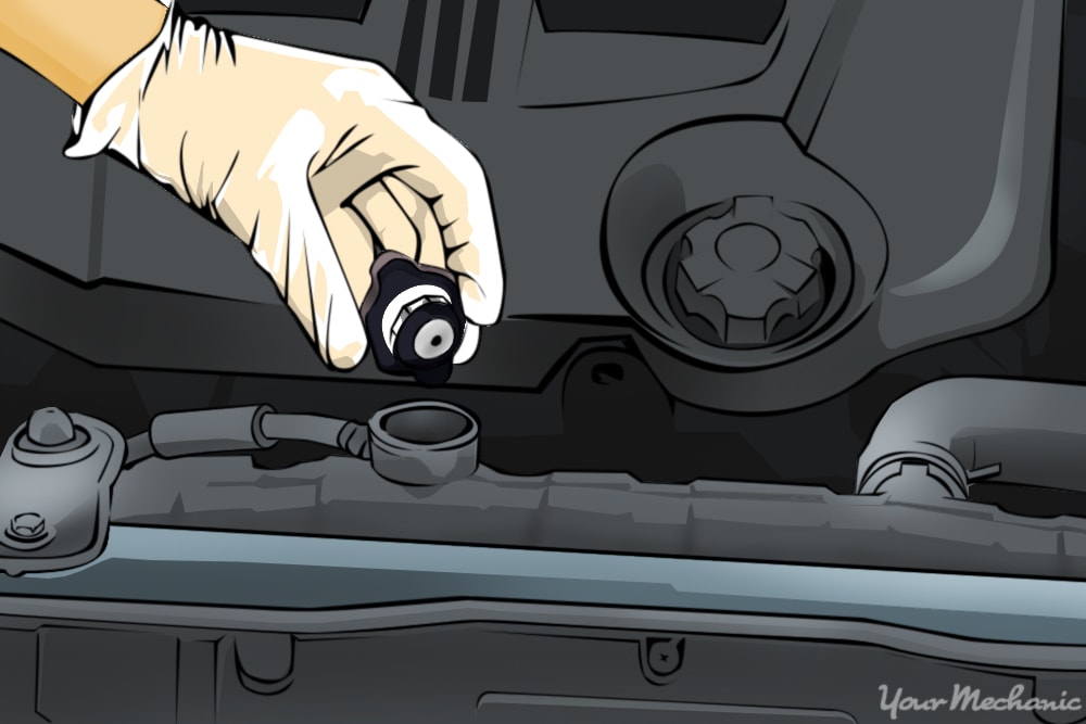 hand removing the radiator cap