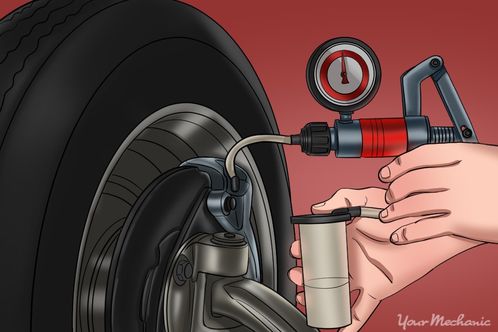 vampire pump in use to remove brake fluid