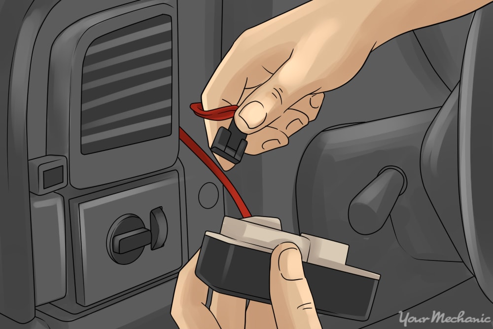 releasing locking tab to disconnect the electrical connector