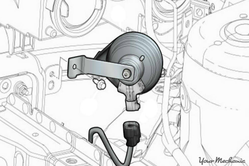 diagram showing how to remove the electrical connector from the horn