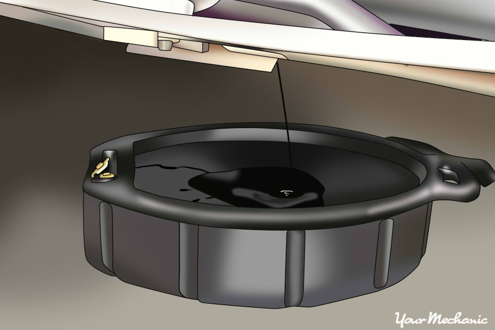 Drain pan underneath power steering supply line