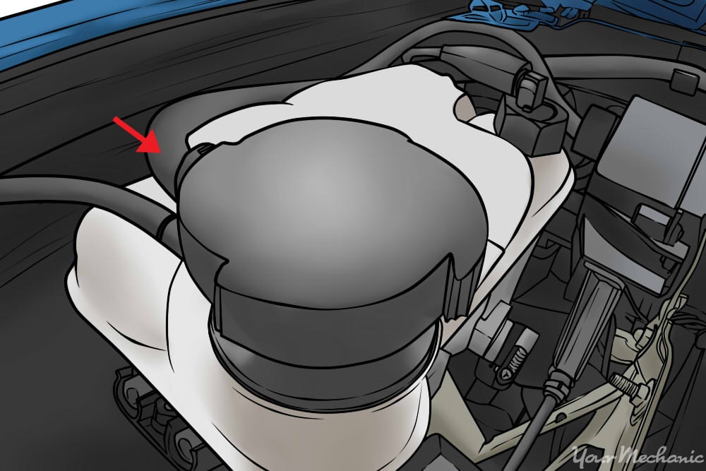 coolant reservoir closeup with arrow pointing to hose