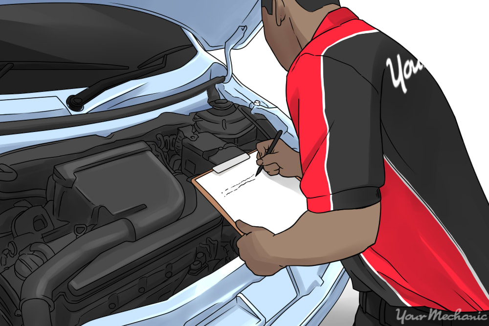 car mechanic with clipboard inspecting the engine