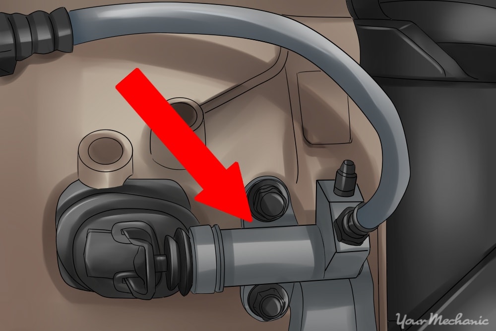 red arrow pointing at slave cylinder