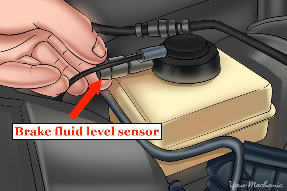 mechanic reinstalling a fluid level sensor