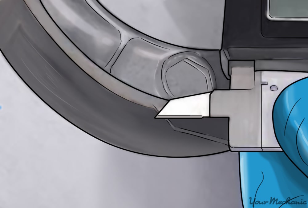 measuring the brake shoes with a digital micrometer