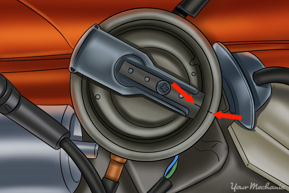 showing distributor rotor lining up with a mark on the distributor