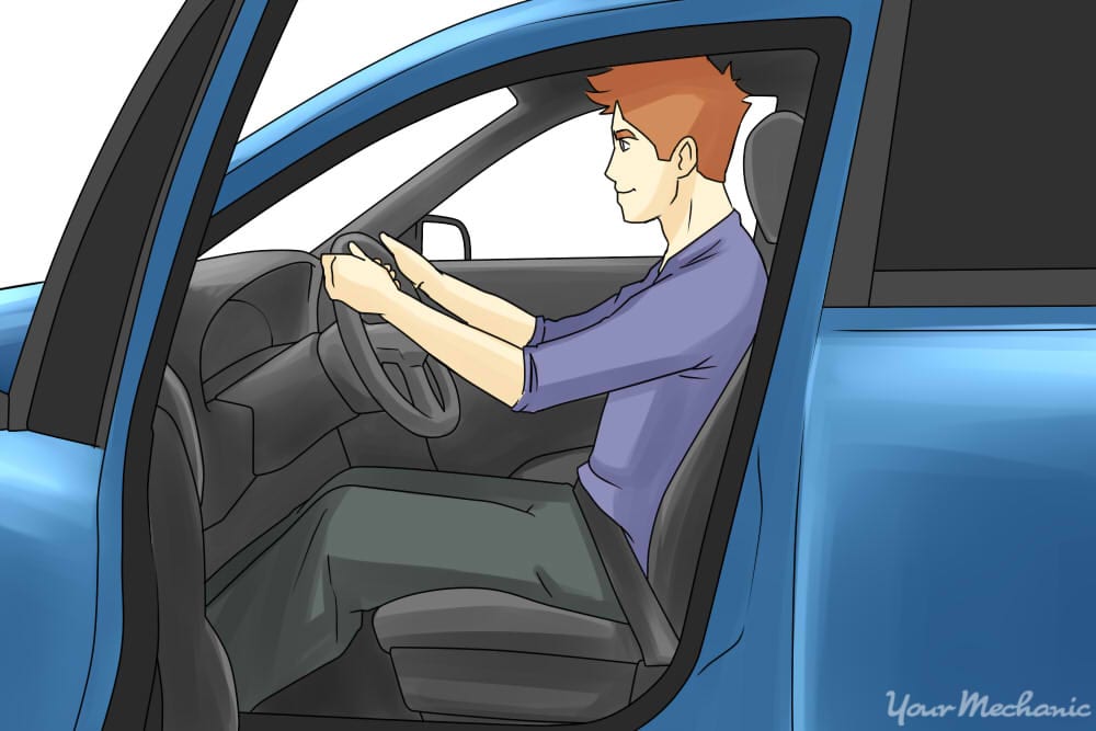 person sitting in an upright posture in the driver