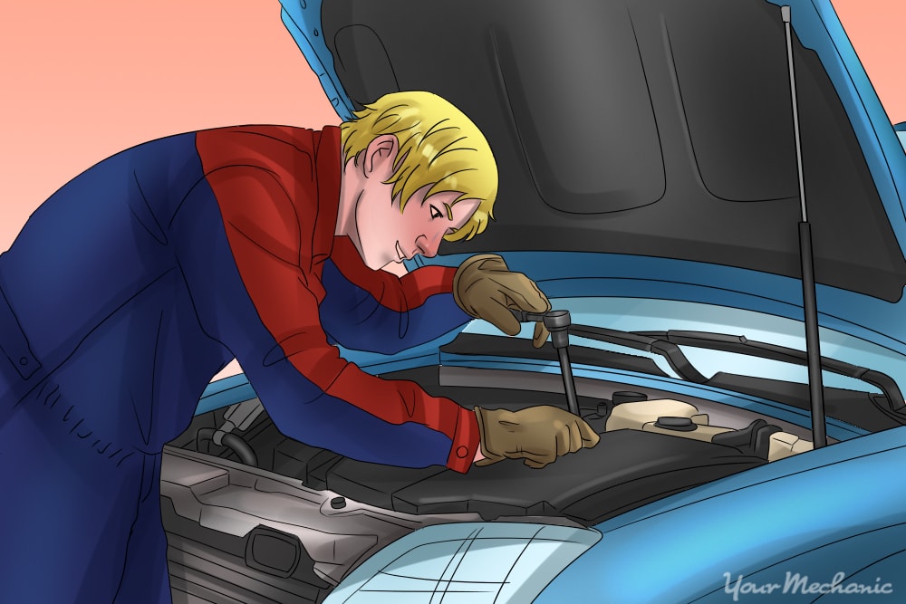 mechanic working on a car