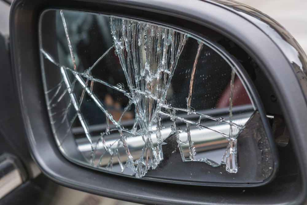 Do I Need To Entirely Replace A Cracked Mirror YourMechanic Advice   Broken Side Mirror