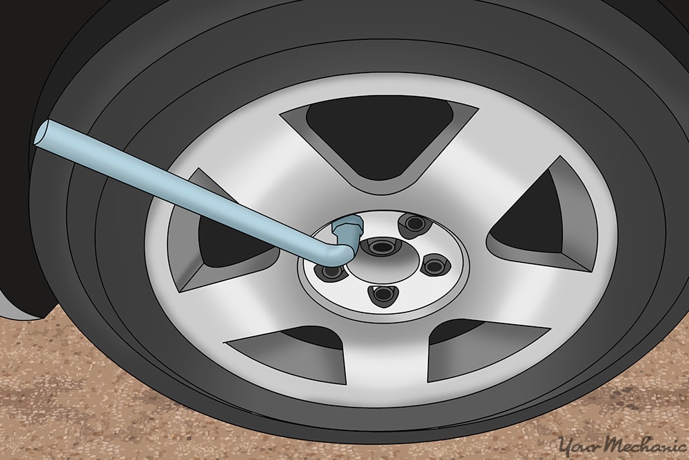 lug wrench attached to one of the lug nuts