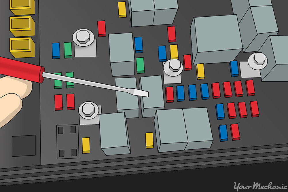 inside of a fuse box with an arrow pointing to a relay