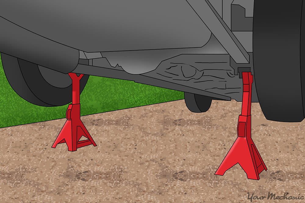 How to Properly Use a Floor Jack and Jack Stands YourMechanic Advice