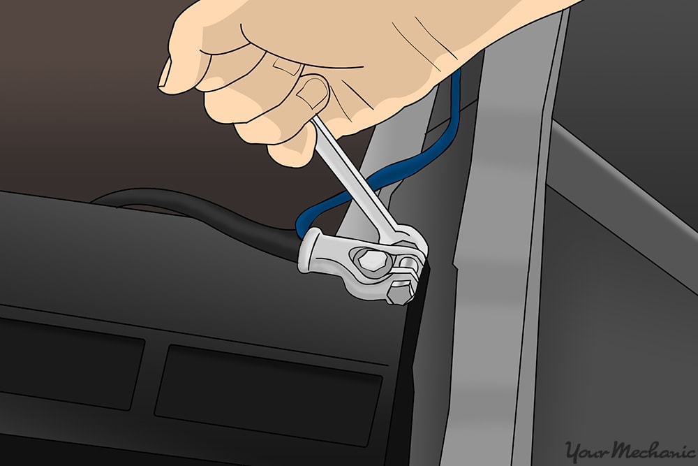 battery being disconnected using wrench