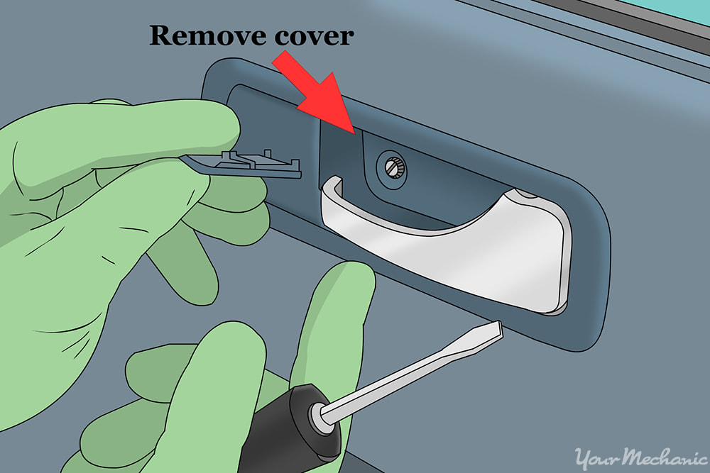 hand removing the plastic cover from behind the door handle