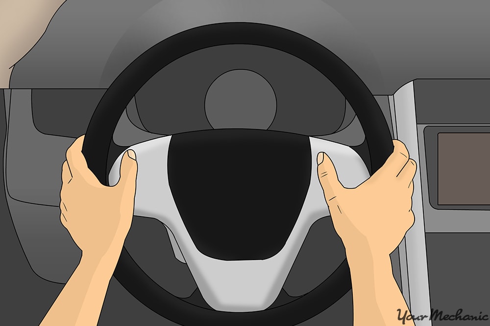 driver POV with hands on steering wheel