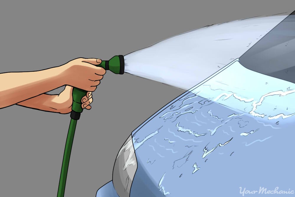 hosing off a car