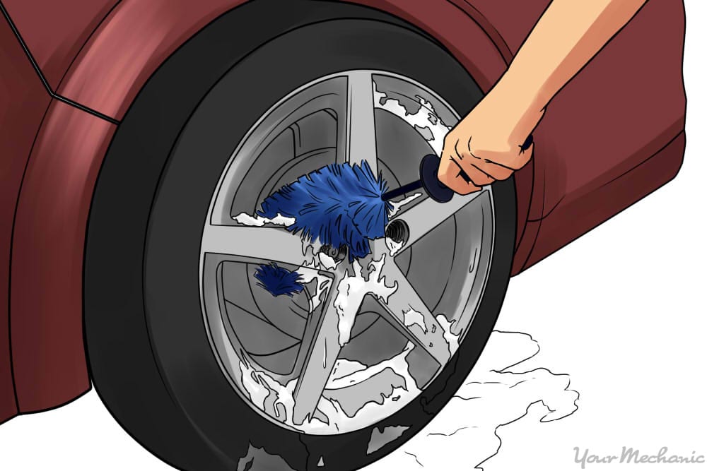 washing wheels with brush