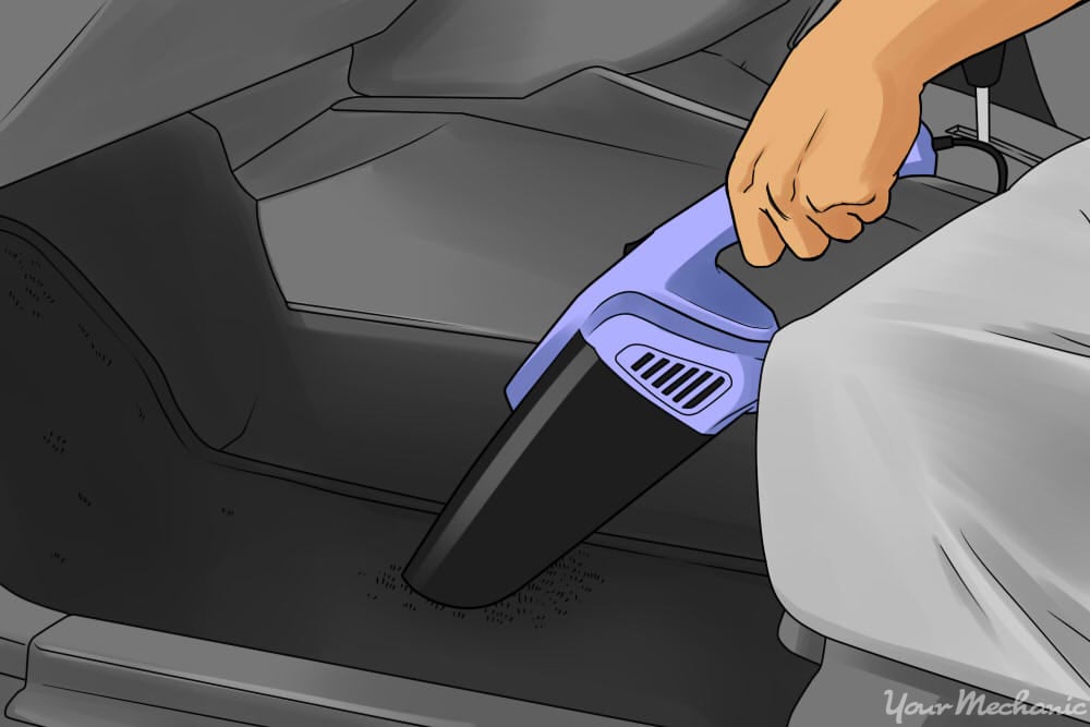 vacuuming car carpet