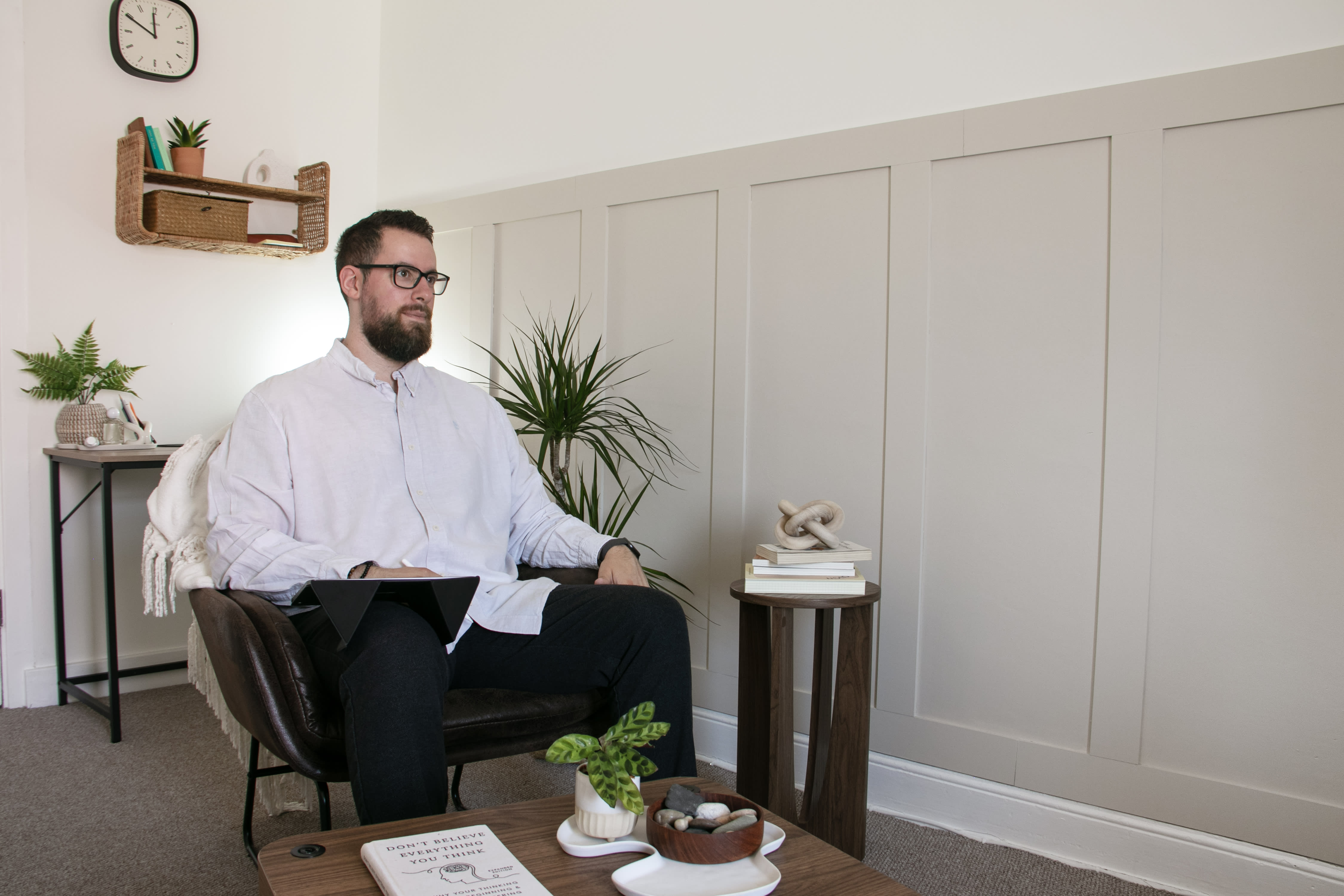 Jolian seated in the consultation room