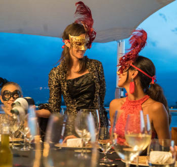 Venetian masked dinner on a superyacht