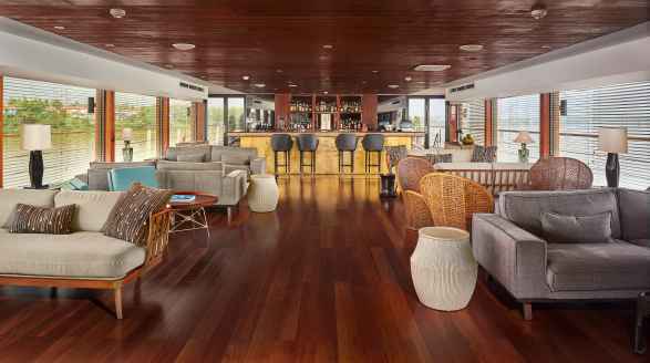 62m charter yacht Aqua Mekong indoor lounge