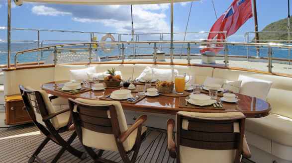 53m sailing yacht Drumbeat for charter - dining area on deck